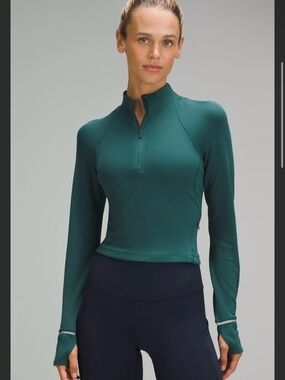 Lululemon It's Rulu Run Ribbed
Cropped Half Zip
Storm Teal
Size: 8